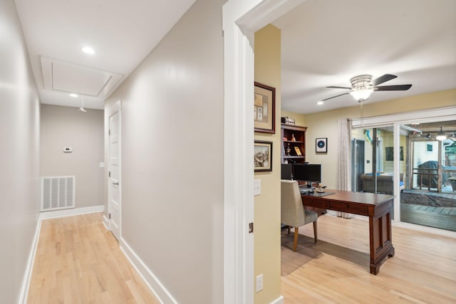 hallway featuring light wood-type flooring