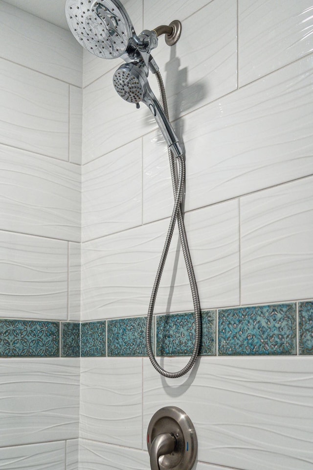 details featuring a tile shower