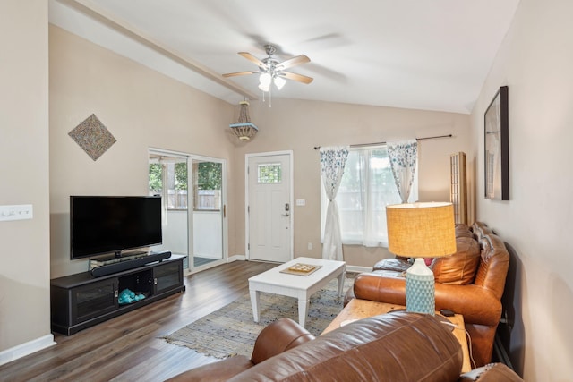 living room with ceiling fan, hardwood / wood-style floors, and lofted ceiling