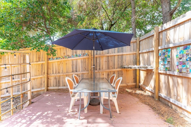 view of patio featuring a deck