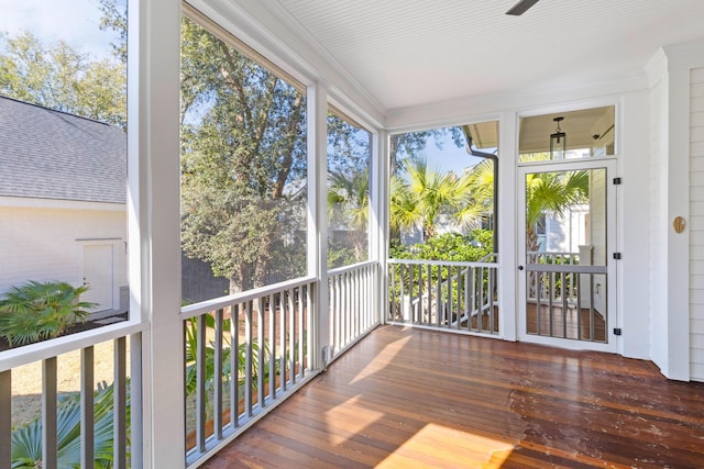 unfurnished sunroom with a wealth of natural light