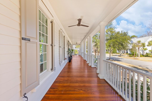 exterior space featuring a ceiling fan