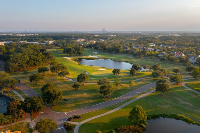 aerial view at dusk with a water view