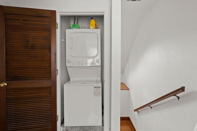 laundry room featuring stacked washer / dryer