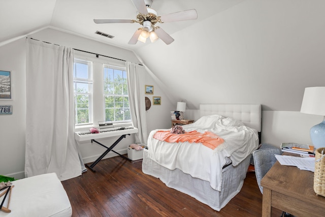 bedroom featuring ceiling fan, vaulted ceiling, and dark wood-type flooring