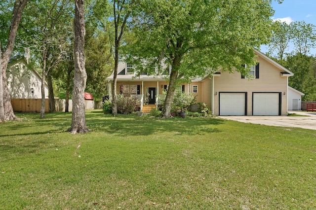 213 Travelers Rest Blvd, Summerville, SC 29485 - view of front facade featuring driveway, an attached garage, a front lawn, fence, and covered porch