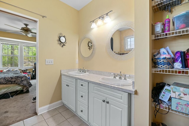 213 Travelers Rest Blvd, Summerville, SC 29485 - bathroom with tile patterned floors, double vanity, a sink, and a ceiling fan