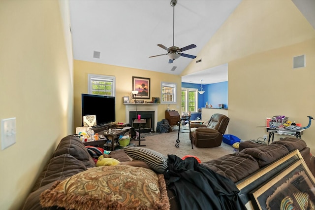 213 Travelers Rest Blvd, Summerville, SC 29485 - living area featuring visible vents, ceiling fan, carpet floors, a fireplace with flush hearth, and high vaulted ceiling