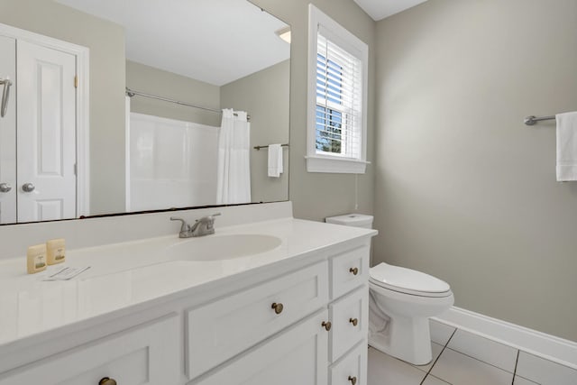 bathroom featuring vanity, toilet, tile patterned floors, and a shower with curtain