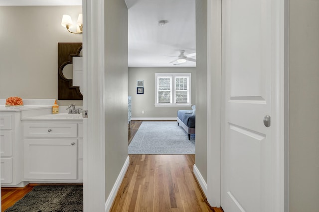 interior space featuring light hardwood / wood-style flooring and sink