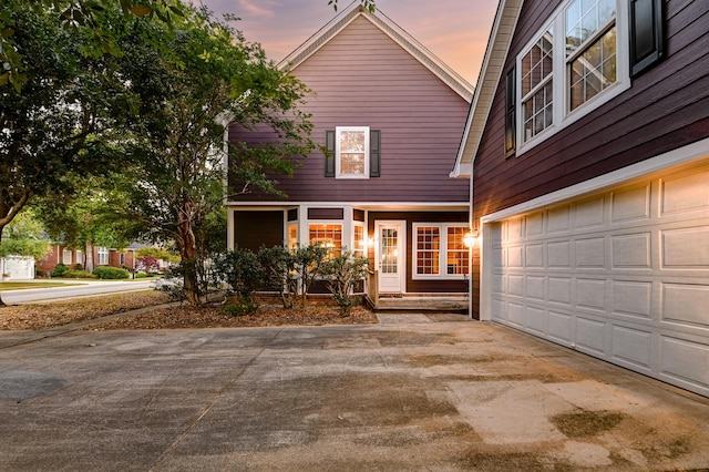 view of front of house featuring driveway and an attached garage