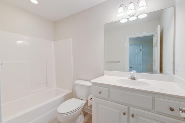 full bathroom with toilet, vanity, bathing tub / shower combination, and baseboards