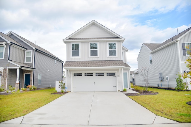 front of property with a garage and a front yard