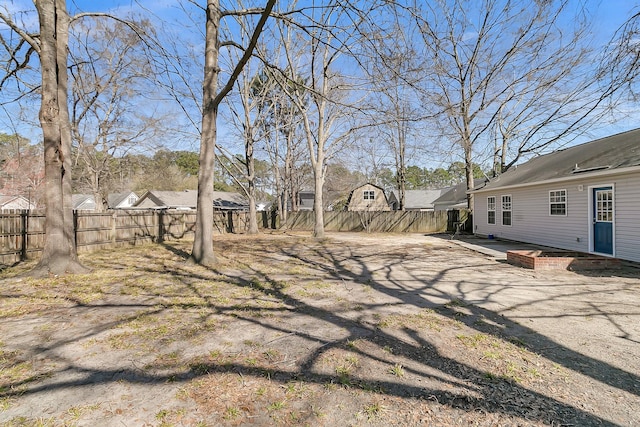 view of yard featuring a fenced backyard