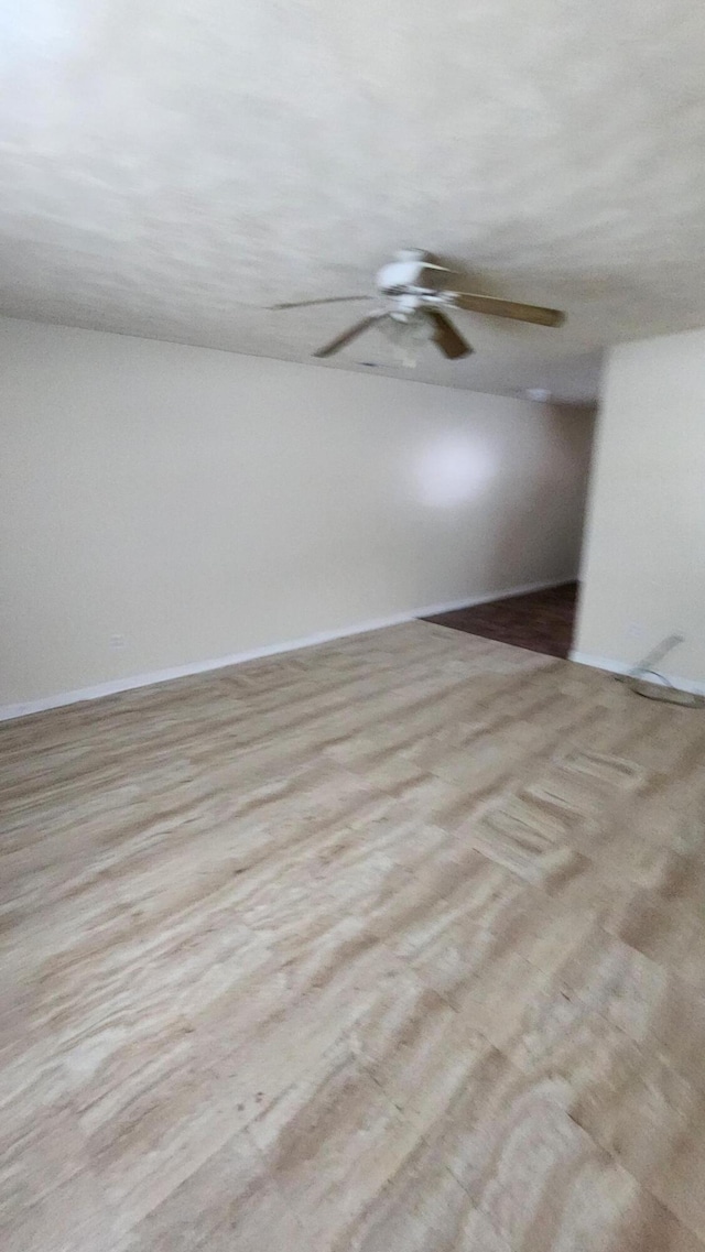 empty room with ceiling fan