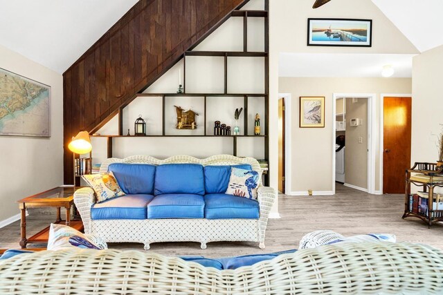 7897 Russell Creek Dr, Edisto Island, SC 29438 - bedroom featuring wood finished floors, vaulted ceiling, and baseboards