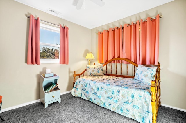 7897 Russell Creek Dr, Edisto Island, SC 29438 - carpeted bedroom with baseboards and ceiling fan