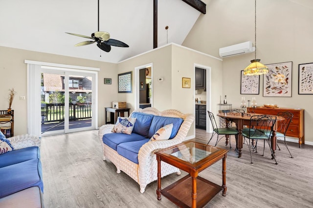 7897 Russell Creek Dr, Edisto Island, SC 29438 - living room with a wall mounted air conditioner, light wood finished floors, ceiling fan, high vaulted ceiling, and baseboards