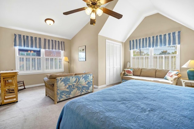 7897 Russell Creek Dr, Edisto Island, SC 29438 - carpeted bedroom featuring vaulted ceiling, baseboards, ceiling fan, and a closet
