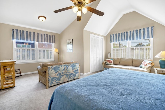 7897 Russell Creek Dr, Edisto Island, SC 29438 - bedroom with vaulted ceiling, multiple windows, baseboards, carpet flooring, and a ceiling fan