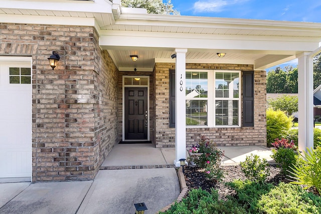 doorway to property with a porch