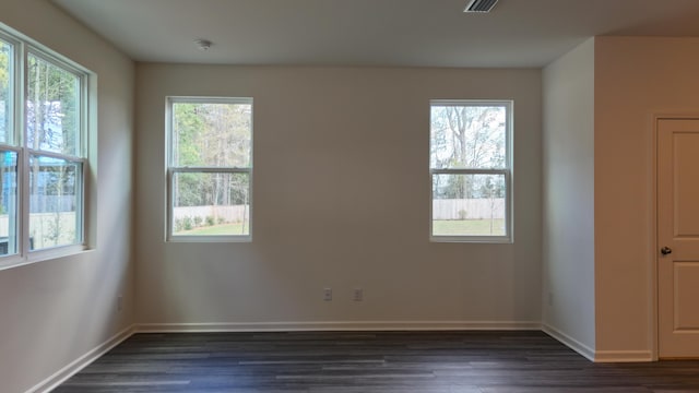 2007 Scarlett Maple St, Summerville, SC 29486 - unfurnished room with plenty of natural light, dark wood finished floors, and baseboards