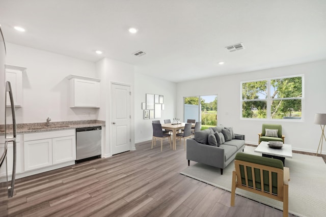 2007 Scarlett Maple St, Summerville, SC 29486 - living area featuring light wood-style floors, baseboards, and recessed lighting