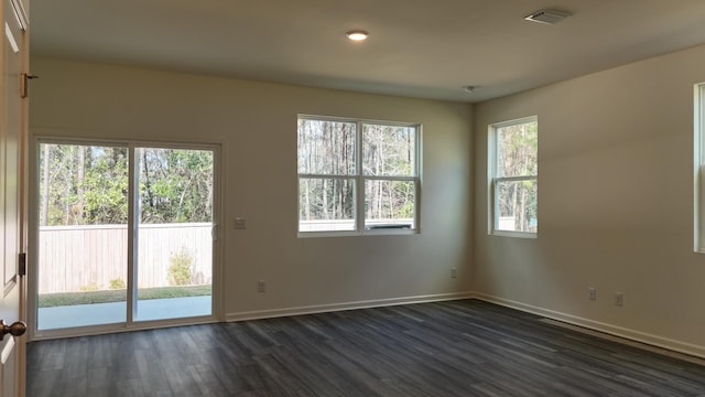 2007 Scarlett Maple St, Summerville, SC 29486 - unfurnished room featuring dark wood-style flooring, plenty of natural light, baseboards, and recessed lighting