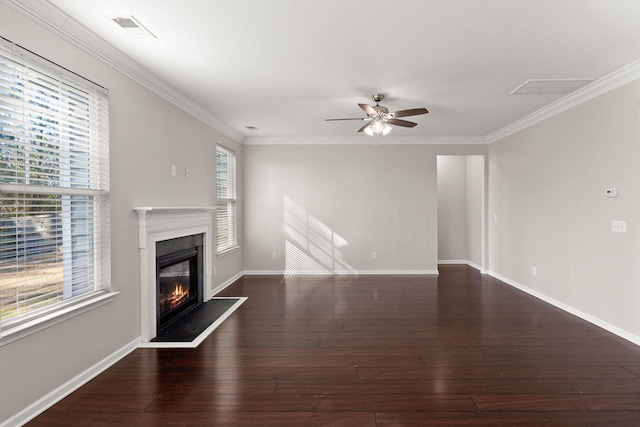 unfurnished living room featuring ceiling fan, dark hardwood / wood-style flooring, and crown molding