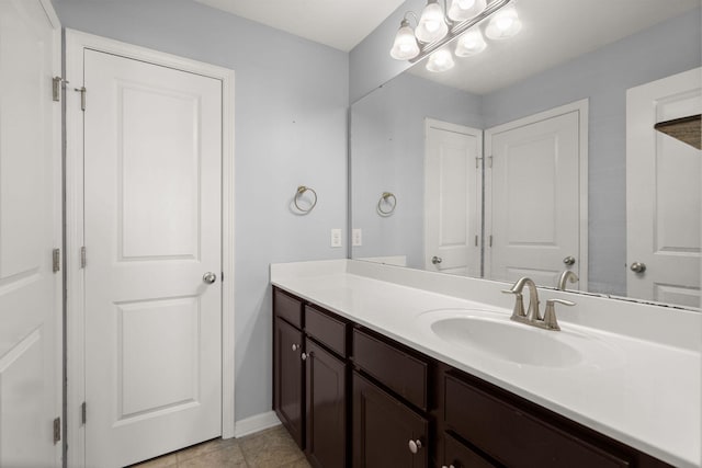 bathroom with vanity and tile patterned floors