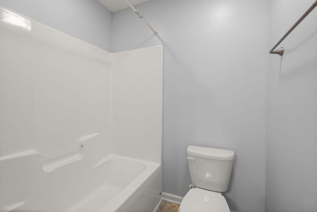 bathroom featuring toilet and shower / bath combination