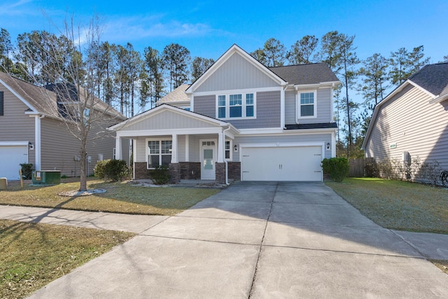 craftsman inspired home featuring a front lawn, cooling unit, a porch, and a garage