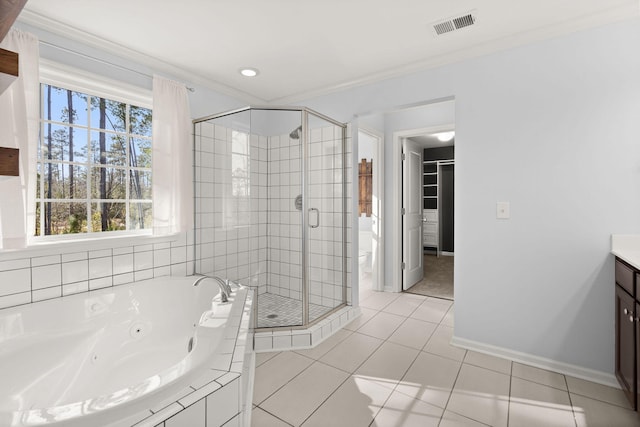 full bathroom with toilet, ornamental molding, tile patterned flooring, and vanity