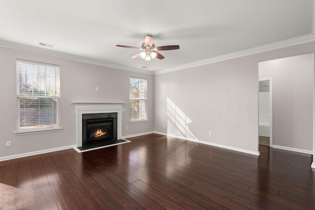 unfurnished living room with ceiling fan, dark hardwood / wood-style flooring, and crown molding