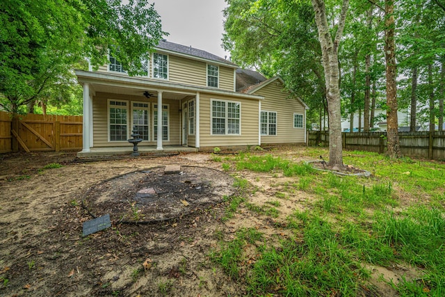 1629 Jorrington St, Mount Pleasant, SC 29466 - rear view of property with ceiling fan, a fenced backyard, and a patio