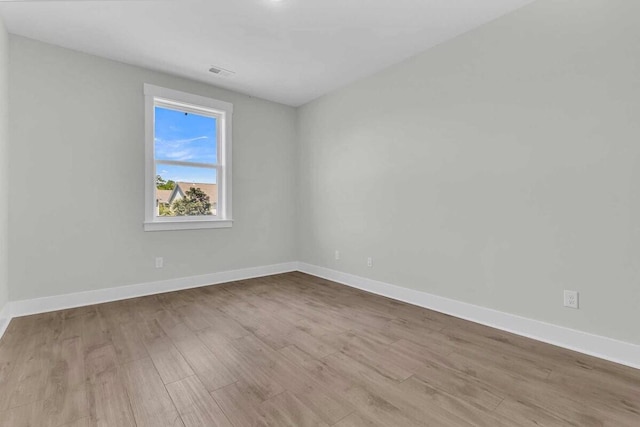 1183 Reserve Ln, Awendaw, SC 29429 - unfurnished room featuring wood finished floors and baseboards