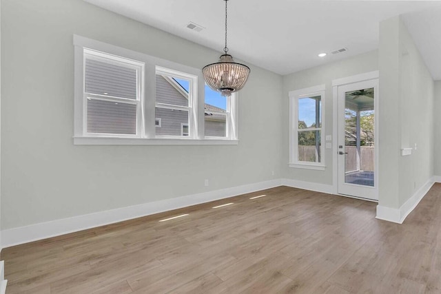 1183 Reserve Ln, Awendaw, SC 29429 - unfurnished dining area featuring wood finished floors, a chandelier, and recessed lighting