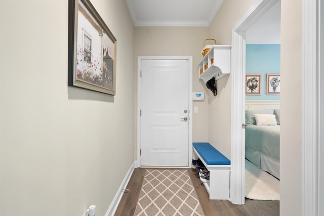 mudroom featuring hardwood / wood-style floors and ornamental molding