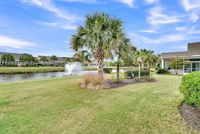 view of yard with a water view