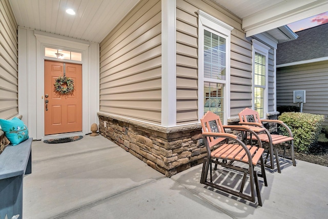 entrance to property with covered porch