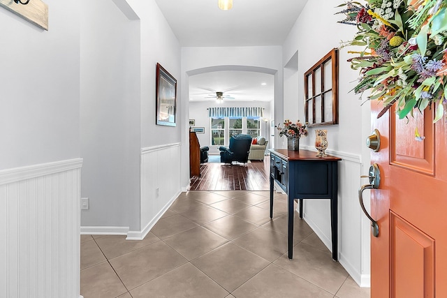 hallway featuring tile patterned flooring