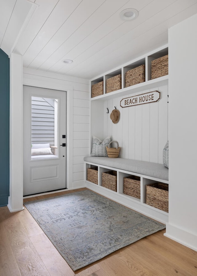 mudroom with wood-type flooring