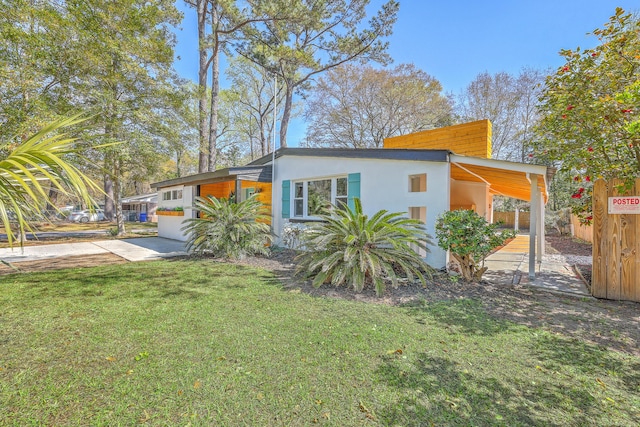 32 Briarcliff Dr, Charleston, SC 29407 - view of front facade with a front lawn, stucco siding, and driveway