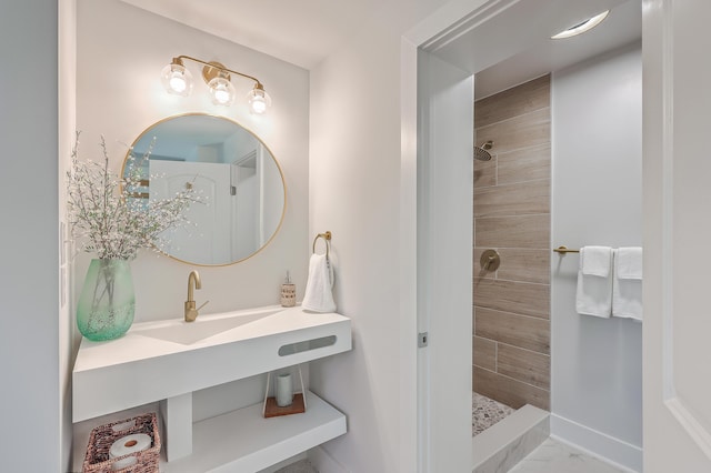 32 Briarcliff Dr, Charleston, SC 29407 - bathroom with tiled shower, vanity, and baseboards