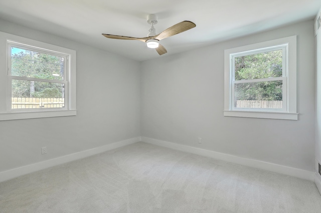 32 Briarcliff Dr, Charleston, SC 29407 - carpeted empty room with plenty of natural light, baseboards, and ceiling fan