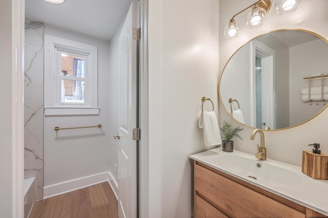 32 Briarcliff Dr, Charleston, SC 29407 - full bath with vanity, wood finished floors, baseboards, and a tub