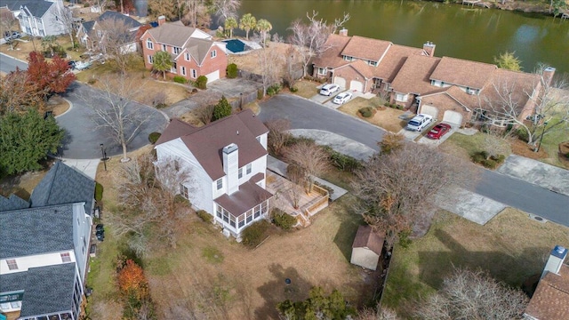 drone / aerial view with a water view