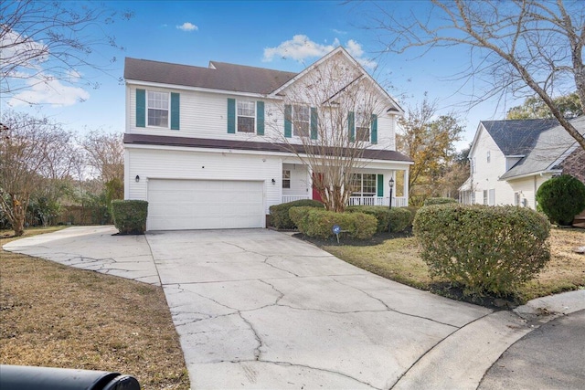 front of property with a garage