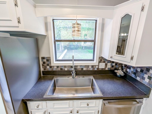 5 Drummond Ct, Charleston, SC 29414 - kitchen featuring stainless steel appliances, a sink, dark countertops, white cabinets, and tasteful backsplash