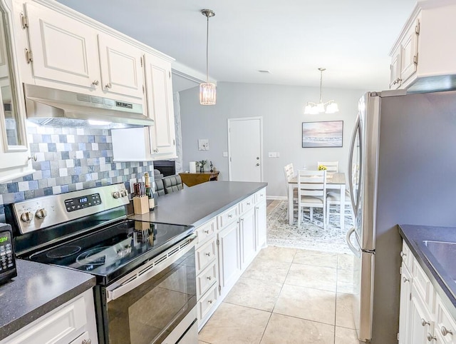 5 Drummond Ct, Charleston, SC 29414 - kitchen with stainless steel appliances, under cabinet range hood, and dark countertops